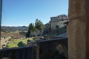 a view of a village from a building at Albergue de Sos del Rey Católico in Sos del Rey Católico