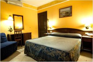 Postel nebo postele na pokoji v ubytování B&B Degli Amici