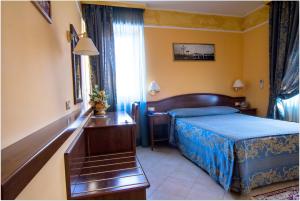 Postel nebo postele na pokoji v ubytování B&B Degli Amici