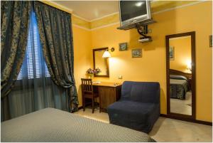 Postel nebo postele na pokoji v ubytování B&B Degli Amici