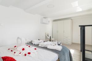 Postel nebo postele na pokoji v ubytování Villa Eunomia