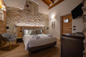 Postel nebo postele na pokoji v ubytování Les Plaisirs d'Antan + 37 fotografií