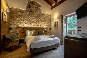 Postel nebo postele na pokoji v ubytování Les Plaisirs d'Antan