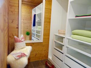 a room with a closet with a stool in it at MEB Appartement in Blaichach
