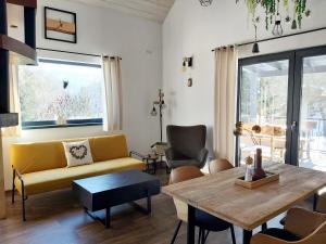 Posezení v ubytování LOFT WAPITI