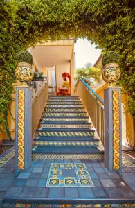 a set of stairs leading up to a house at Meublè Tripoli in Grado