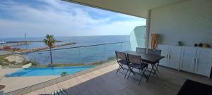 Fotografija v galeriji nastanitve NEPITA- Vue mer- piscine en résidence de standing- clim-Wifi v mestu Sari Solenzara