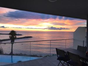 Fotografija v galeriji nastanitve NEPITA- Vue mer- piscine en résidence de standing- clim-Wifi v mestu Sari Solenzara