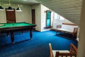 Posedenie v ubytovaní Hotel Vedmezhyi Dvir