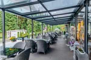 Posedenie v ubytovaní Hotel Vedmezhyi Dvir