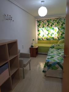 Łóżko lub łóżka w pokoju w obiekcie Eva Santa pola