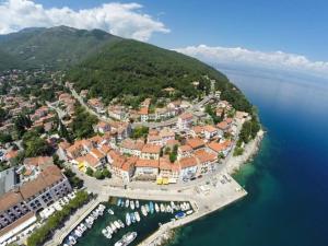 an aerial view of a small town on the water at Apartman Modric Draga in Mošćenička Draga