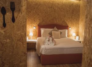Posteľ alebo postele v izbe v ubytovaní Medronho D'Ouro bungalows
