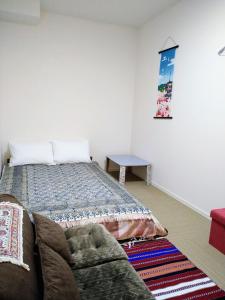 Giường trong phòng chung tại Tokyo stay Hut SARI - Vacation STAY 27260v