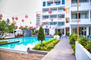 Bazén v ubytování Naiya Sea Resort nebo v jeho okolí