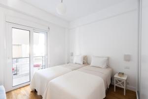 Posteľ alebo postele v izbe v ubytovaní Wonderful Central Athens 2 Bedroom 2 Bath Sleeps 8