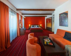 Postel nebo postele na pokoji v ubytování Hotel Villa Donat