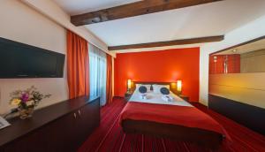 Postel nebo postele na pokoji v ubytování Hotel Villa Donat