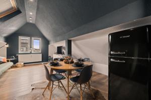 Μια τηλεόραση ή/και κέντρο ψυχαγωγίας στο Loft im Herzen von Friedrichshafen - klimatisiert