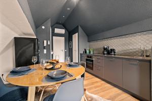 Η κουζίνα ή μικρή κουζίνα στο Loft im Herzen von Friedrichshafen - klimatisiert