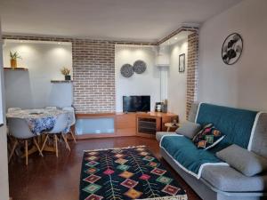 Posezení v ubytování Precioso apartamento con vistas al mar con piscina