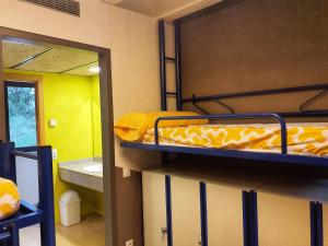 Posteľ alebo postele v izbe v ubytovaní Alberg Sant Joan de les Abadesses Xanascat