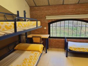 Posteľ alebo postele v izbe v ubytovaní Alberg Sant Joan de les Abadesses Xanascat