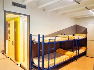 Posteľ alebo postele v izbe v ubytovaní Alberg Sant Joan de les Abadesses Xanascat