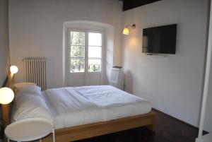 Ένα ή περισσότερα κρεβάτια σε δωμάτιο στο Porticciolo Apartment +30 φωτογραφίες