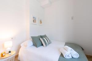 Posteľ alebo postele v izbe v ubytovaní Precioso Apto en Alameda