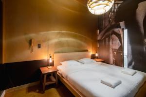 Ένα ή περισσότερα κρεβάτια σε δωμάτιο στο National Street Residence