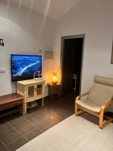 Telewizja i/lub zestaw kina domowego w obiekcie Casa De Chenil - Caminito del Rey