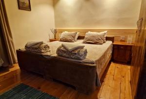 Posteľ alebo postele v izbe v ubytovaní Konak -Guest house -Ramonda Serbika