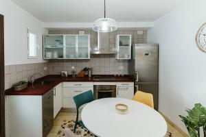 Kuchyň nebo kuchyňský kout v ubytování Ohliving Alhondiga