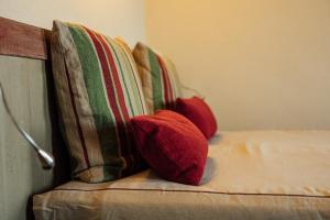 A bed or beds in a room at Prime Alture Wine Resort