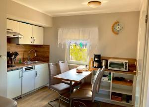 Η κουζίνα ή μικρή κουζίνα στο Ferienbungalow Lange