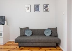 Posezení v ubytování Radunia Apartment z parkingiem przy dworcu