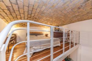 Postel nebo postele na pokoji v ubytování Lovely Loft near Termini Station
