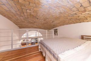 Postel nebo postele na pokoji v ubytování Lovely Loft near Termini Station