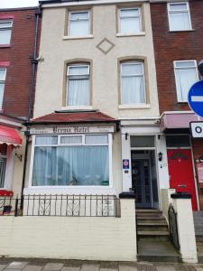 a house on the corner of a street at The Brema Hotel in Blackpool