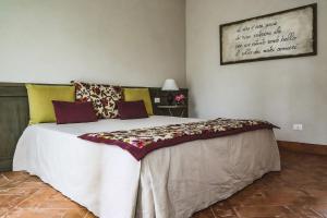 A bed or beds in a room at Prime Alture Wine Resort