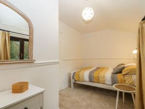 Postel nebo postele na pokoji v ubytování Craig Mawr