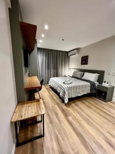 Een bed of bedden in een kamer bij América apart-hotel