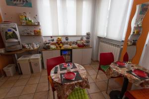 Kuchyň nebo kuchyňský kout v ubytování Hotel Pontenuovo