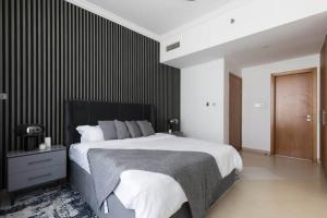 Postel nebo postele na pokoji v ubytování 1 Bedroom Apartment in Dorra Bay #7
