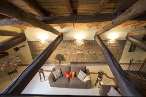 an overhead view of a living room with a couch at Residenza Bianconcini in Bologna