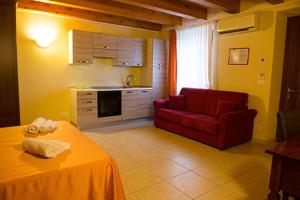 Posezení v ubytování Le Murette Apartments - ENJOY HOLIDAY + 5 fotografií