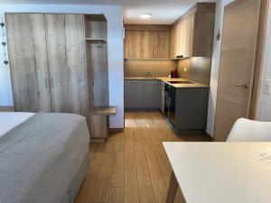 Kuchyň nebo kuchyňský kout v ubytování Modernes Studio Zermatt