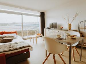 TV a/nebo společenská místnost v ubytování Studio Seastar by Interhome