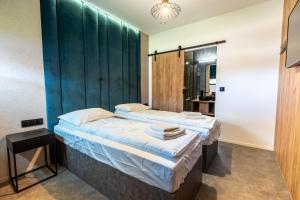 Un pat sau paturi într-o cameră la IronResorts
